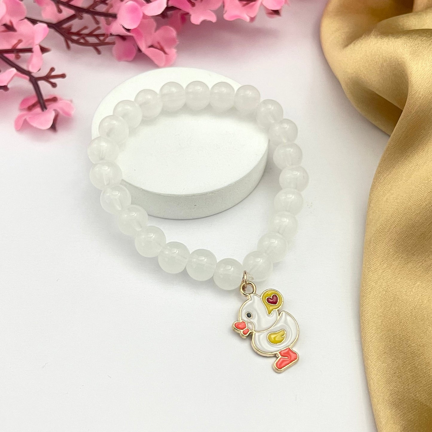 Stretchable White Glass Bead Bracelet With Duck Charm