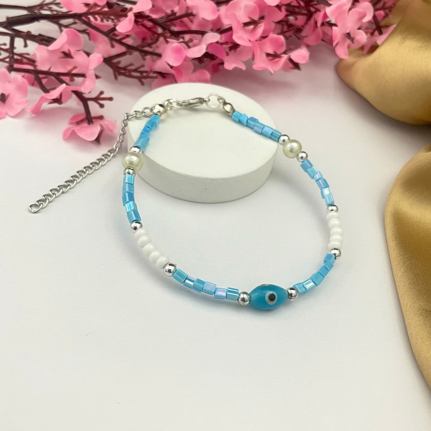 Stretchable Blue & White Bead Bracelet With Evil Eye