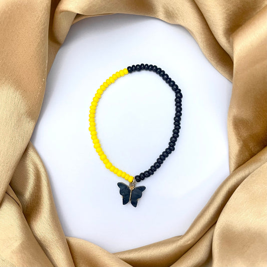 Stretchable Yellow & Black Joco Beads Bracelet  With Black Butterfly Charm